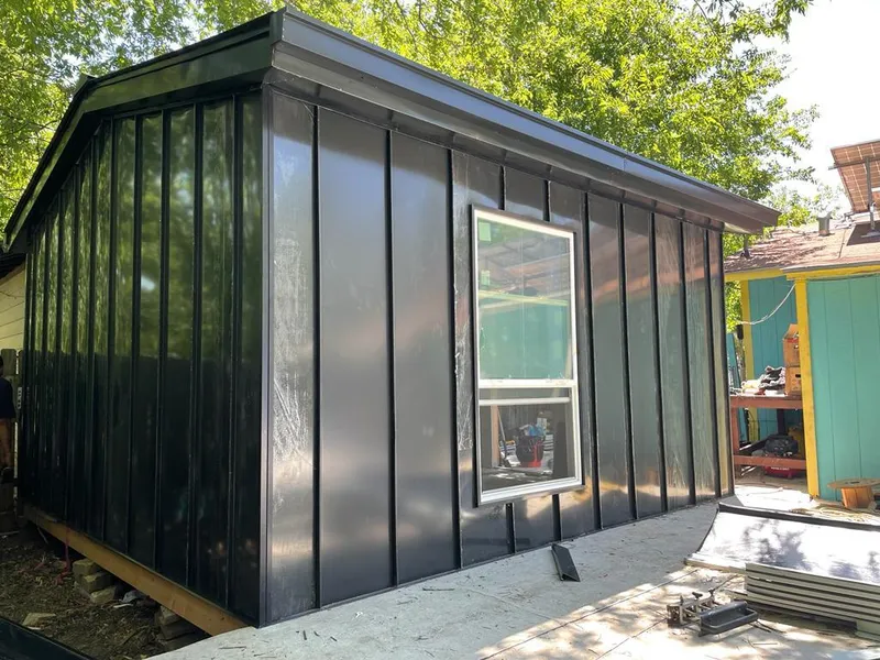 Black standing seam metal wall panels for Metal Roof Installation in Rossford