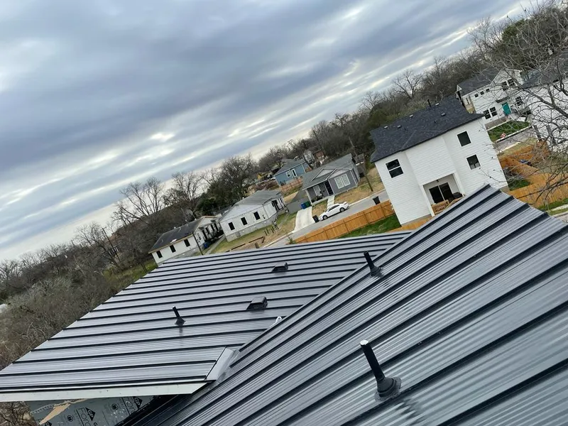 Standing seam metal roof panels with vents for Skylight Repair in Rossford